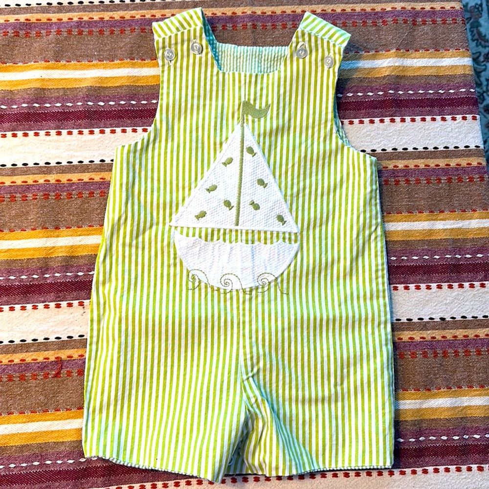 Boys green sailboat shortall.